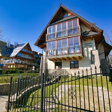 アパート Szafir Mozaika Centrum Piec Kominkowy ザコパネ